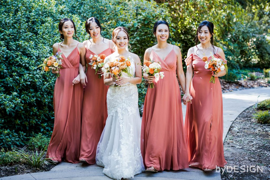 Bride and Bridesmaids with Bouquet of flowers
