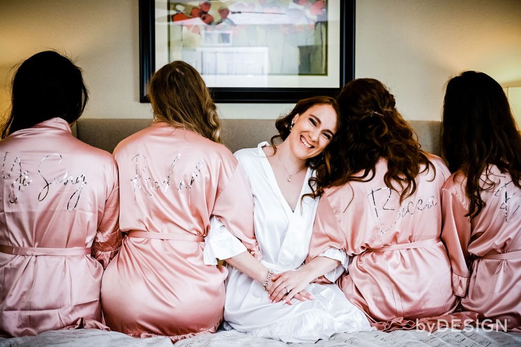 bride and bridesmaids getting ready pic
